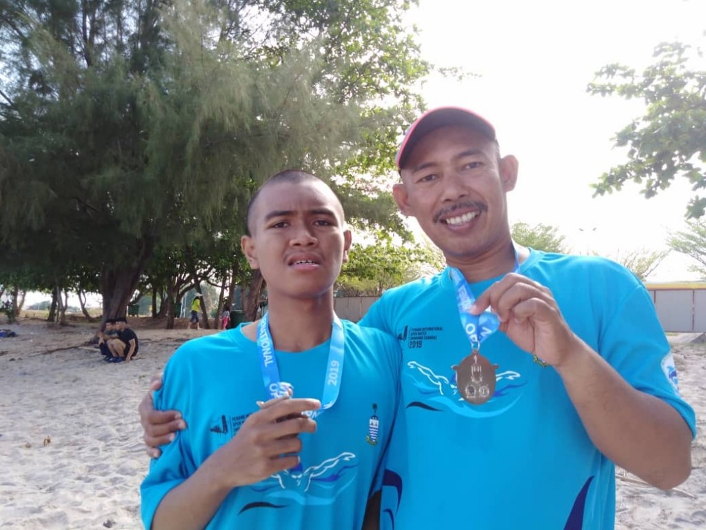 Muhammad Aliff Aiman Bin Mohd Mizan, 16 tahun yang telah berjaya  berenang 2km di Bagan Ajam dalam Penang International Swimming Carnival 2019
