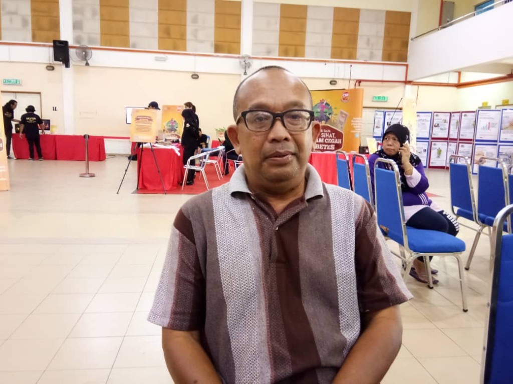 Atan Dayat, 63, ketika ditemui sedang menunggu giliran pemeriksaan kesihatan percuma