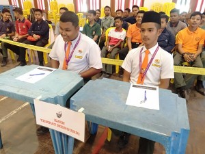 Haiqal Harith pelajar sekolah menengah kebangsan alor Pasir (bersongkok)