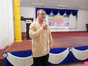 Penolong Pengarah JaPen Terengganu, Saharrudin Mohamed menyampaikan ceramahnya tentang pencegahan penipuan dalam talian.