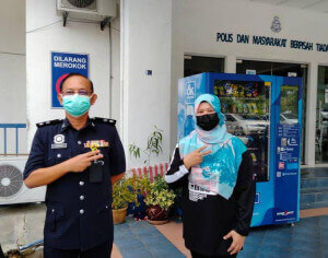 Supt. Arshad Abu bersama Salina Hasan @ Abd. Rashid.