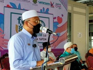 Menteri di Jabatan Perdana Menteri (Hal Ehwal Agama), Senator Tuan Haji Idris Ahmad, ketika berucap merasmikan majlis.